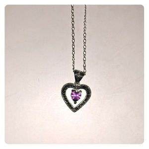 Silver necklace with purple stone